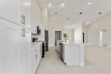 STUNNING NEW CONSTRUCTION HOME in Indian Lake Estates - Golf on Indian Lake Estates Golf and Country Club in Florida - for sale on GolfHomes.com, golf home, golf lot