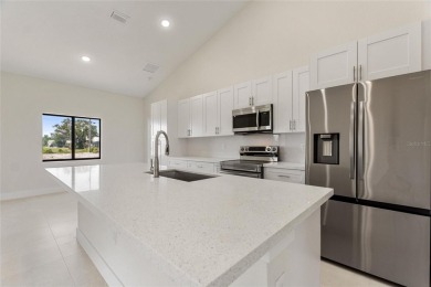 STUNNING NEW CONSTRUCTION HOME in Indian Lake Estates - Golf on Indian Lake Estates Golf and Country Club in Florida - for sale on GolfHomes.com, golf home, golf lot