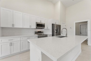 STUNNING NEW CONSTRUCTION HOME in Indian Lake Estates - Golf on Indian Lake Estates Golf and Country Club in Florida - for sale on GolfHomes.com, golf home, golf lot