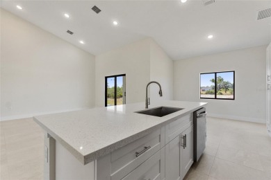 STUNNING NEW CONSTRUCTION HOME in Indian Lake Estates - Golf on Indian Lake Estates Golf and Country Club in Florida - for sale on GolfHomes.com, golf home, golf lot
