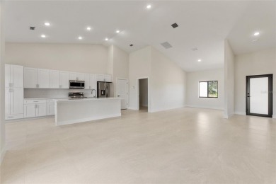 STUNNING NEW CONSTRUCTION HOME in Indian Lake Estates - Golf on Indian Lake Estates Golf and Country Club in Florida - for sale on GolfHomes.com, golf home, golf lot