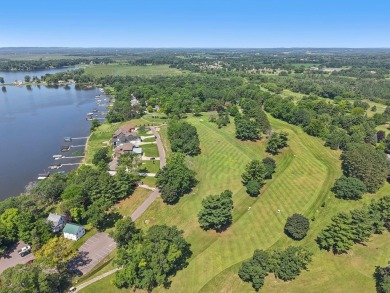 Welcome to your private retreat on the greens of Portage Country on Portage Country Club in Wisconsin - for sale on GolfHomes.com, golf home, golf lot
