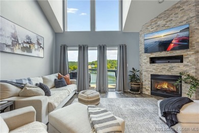Experience lake life at its finest in this stunning 4-bedroom on The Club At Old Kinderhook in Missouri - for sale on GolfHomes.com, golf home, golf lot