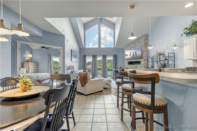 Experience lake life at its finest in this stunning 4-bedroom on The Club At Old Kinderhook in Missouri - for sale on GolfHomes.com, golf home, golf lot
