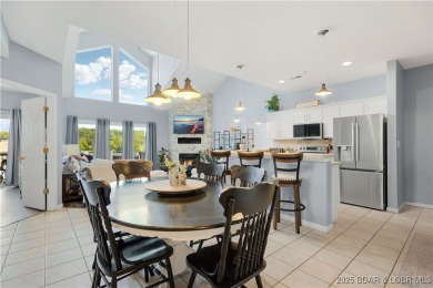 Experience lake life at its finest in this stunning 4-bedroom on The Club At Old Kinderhook in Missouri - for sale on GolfHomes.com, golf home, golf lot
