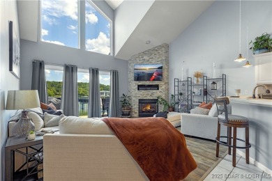 Experience lake life at its finest in this stunning 4-bedroom on The Club At Old Kinderhook in Missouri - for sale on GolfHomes.com, golf home, golf lot
