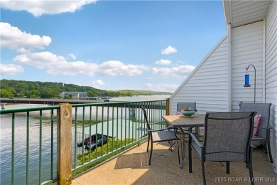 Experience lake life at its finest in this stunning 4-bedroom on The Club At Old Kinderhook in Missouri - for sale on GolfHomes.com, golf home, golf lot