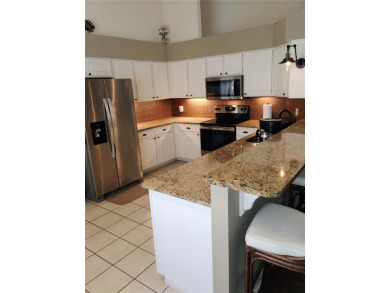 Custom built 3-bedroom, 2-bathroom masonry-built home nestled on on Glen Abbey Golf Club in Florida - for sale on GolfHomes.com, golf home, golf lot