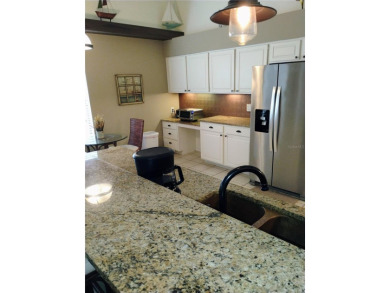 Custom built 3-bedroom, 2-bathroom masonry-built home nestled on on Glen Abbey Golf Club in Florida - for sale on GolfHomes.com, golf home, golf lot