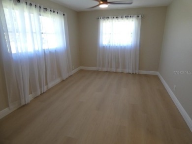 An amazing 2-bedroom, 2-bath Villa/Condo, with Large 1 Car on Highland Lakes Executive Golf Course in Florida - for sale on GolfHomes.com, golf home, golf lot