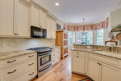 Lovely French country home on beautifully landscaped .47 acre on Woodside Plantation Country Club in South Carolina - for sale on GolfHomes.com, golf home, golf lot
