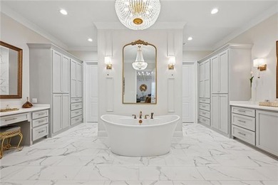 Wake up to serene lake views and end each day with unforgettable on Money Hill Golf and Country Club in Louisiana - for sale on GolfHomes.com, golf home, golf lot