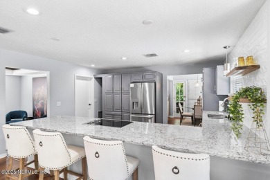 This stunning 3 bedroom, 3 bathroom all-brick home sits on a on Hyde Park Golf Club in Florida - for sale on GolfHomes.com, golf home, golf lot