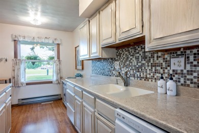 Experience living at its finest with this impeccable 2 bed, 2.5 on Saddle Ridge Golf Club in Wisconsin - for sale on GolfHomes.com, golf home, golf lot