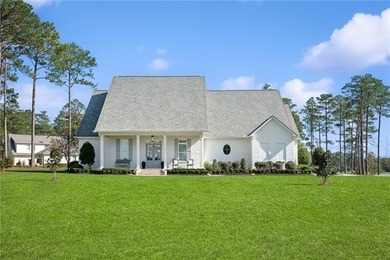 Wake up to serene lake views and end each day with unforgettable on Money Hill Golf and Country Club in Louisiana - for sale on GolfHomes.com, golf home, golf lot