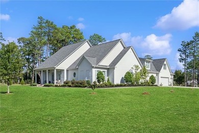 Wake up to serene lake views and end each day with unforgettable on Money Hill Golf and Country Club in Louisiana - for sale on GolfHomes.com, golf home, golf lot