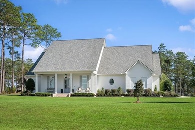 Wake up to serene lake views and end each day with unforgettable on Money Hill Golf and Country Club in Louisiana - for sale on GolfHomes.com, golf home, golf lot