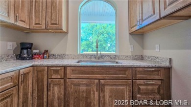 Step into the epitome of luxurious living at The Estates of on The Club At Old Kinderhook in Missouri - for sale on GolfHomes.com, golf home, golf lot