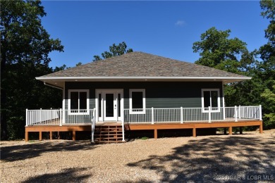Experience unparalleled luxury living at the Estates of on The Club At Old Kinderhook in Missouri - for sale on GolfHomes.com, golf home, golf lot