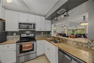 Welcome to 1911 Sabal Palm Dr #105--your serene escape with on Pine Island Ridge Country Club in Florida - for sale on GolfHomes.com, golf home, golf lot