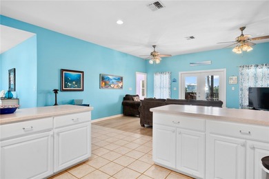 Escape to the coast at 178 Mustang Royale Blvd, a true Port on Palmilla Beach Golf Club in Texas - for sale on GolfHomes.com, golf home, golf lot