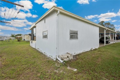 Under contract-accepting backup offers. Escape Winter and on Betmar Acres Golf Club in Florida - for sale on GolfHomes.com, golf home, golf lot