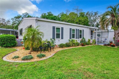 This furnished home is located on a large, beautiful landscaped on Plantation Golf Club in Florida - for sale on GolfHomes.com, golf home, golf lot