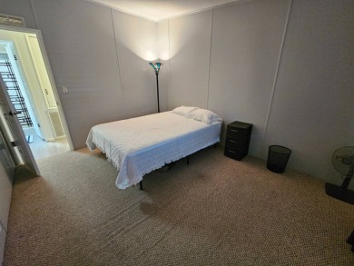 Located in Cypress Lakes Village in a 55+ resort style MH on Big Cypress Golf and Country Club in Florida - for sale on GolfHomes.com, golf home, golf lot