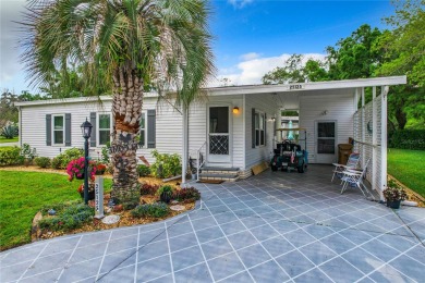 This furnished home is located on a large, beautiful landscaped on Plantation Golf Club in Florida - for sale on GolfHomes.com, golf home, golf lot