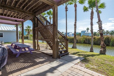 Escape to the coast at 178 Mustang Royale Blvd, a true Port on Palmilla Beach Golf Club in Texas - for sale on GolfHomes.com, golf home, golf lot