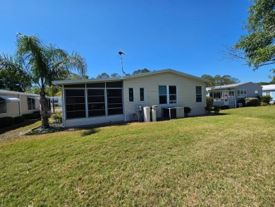 Located in Cypress Lakes Village in a 55+ resort style MH on Big Cypress Golf and Country Club in Florida - for sale on GolfHomes.com, golf home, golf lot