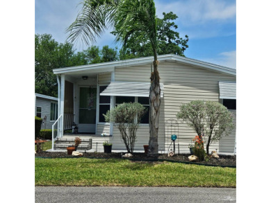 Located in Cypress Lakes Village in a 55+ resort style MH on Big Cypress Golf and Country Club in Florida - for sale on GolfHomes.com, golf home, golf lot
