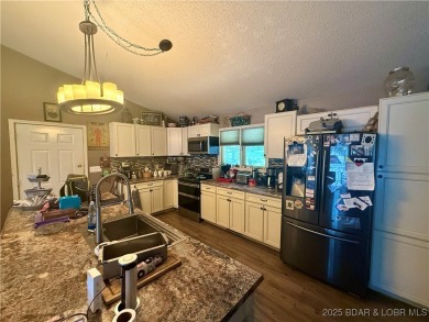 Discover the perfect blend of space, comfort, and privacy in on Oak Hills Country Club in Missouri - for sale on GolfHomes.com, golf home, golf lot