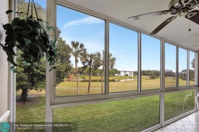 DRASTIC PRICE REDUCTION FOR QUICK SALE! STEP INTO TRANQUIL on Wynmoor Golf Course in Florida - for sale on GolfHomes.com, golf home, golf lot