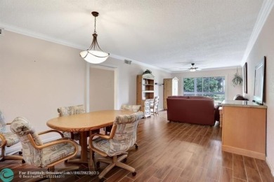 DRASTIC PRICE REDUCTION FOR QUICK SALE! STEP INTO TRANQUIL on Wynmoor Golf Course in Florida - for sale on GolfHomes.com, golf home, golf lot