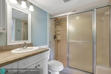 DRASTIC PRICE REDUCTION FOR QUICK SALE! STEP INTO TRANQUIL on Wynmoor Golf Course in Florida - for sale on GolfHomes.com, golf home, golf lot