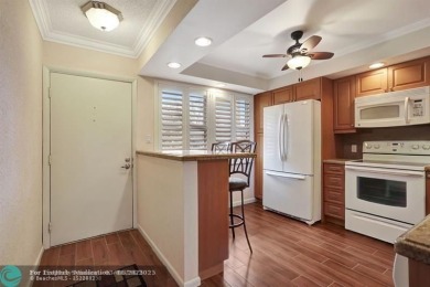 DRASTIC PRICE REDUCTION FOR QUICK SALE! STEP INTO TRANQUIL on Wynmoor Golf Course in Florida - for sale on GolfHomes.com, golf home, golf lot