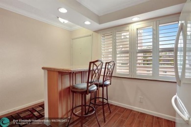 DRASTIC PRICE REDUCTION FOR QUICK SALE! STEP INTO TRANQUIL on Wynmoor Golf Course in Florida - for sale on GolfHomes.com, golf home, golf lot