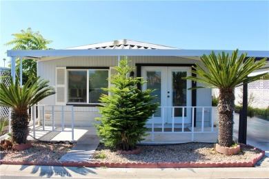 Beautifully updated and move-in ready, this 2-bedroom, 2-bath on Colonial Country Club in California - for sale on GolfHomes.com, golf home, golf lot