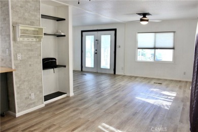 Beautifully updated and move-in ready, this 2-bedroom, 2-bath on Colonial Country Club in California - for sale on GolfHomes.com, golf home, golf lot