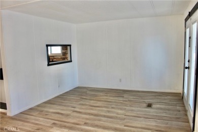 Beautifully updated and move-in ready, this 2-bedroom, 2-bath on Colonial Country Club in California - for sale on GolfHomes.com, golf home, golf lot