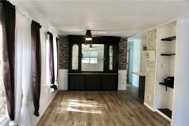 Beautifully updated and move-in ready, this 2-bedroom, 2-bath on Colonial Country Club in California - for sale on GolfHomes.com, golf home, golf lot