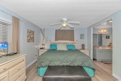This very open and spacious 4-Bedroom, 2 Bath beach house is on Prestwick Country Club in South Carolina - for sale on GolfHomes.com, golf home, golf lot