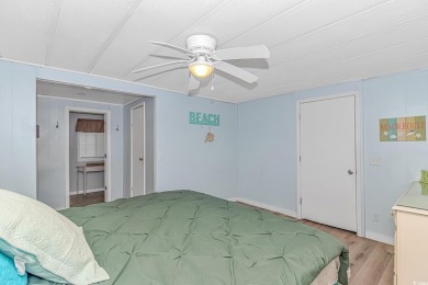 This very open and spacious 4-Bedroom, 2 Bath beach house is on Prestwick Country Club in South Carolina - for sale on GolfHomes.com, golf home, golf lot
