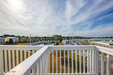 STUNNING LOCATION! Beautiful townhouse overlooking the Northwest on Harbour Point Golf Club in North Carolina - for sale on GolfHomes.com, golf home, golf lot