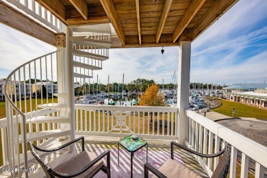 STUNNING LOCATION! Beautiful townhouse overlooking the Northwest on Harbour Point Golf Club in North Carolina - for sale on GolfHomes.com, golf home, golf lot