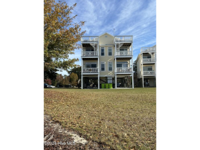 STUNNING LOCATION! Beautiful townhouse overlooking the Northwest on Harbour Point Golf Club in North Carolina - for sale on GolfHomes.com, golf home, golf lot