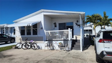 PRICE IMPROVEMENT ON THIS MOVE-IN READY, OPEN CONCEPT MOBILE on River Run Golf Links in Florida - for sale on GolfHomes.com, golf home, golf lot