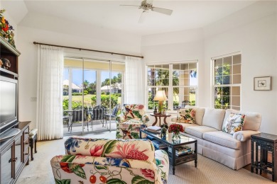 Lovely bright light waterfront villa, with enclosed porch plus on Oak Harbor Country Club in Florida - for sale on GolfHomes.com, golf home, golf lot