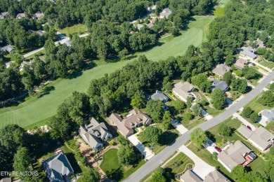 Imagine sitting on this beautiful deck that overlooks the 8th on Stonehenge Golf Course in Tennessee - for sale on GolfHomes.com, golf home, golf lot